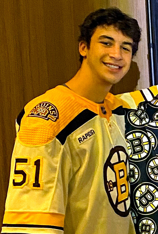 Matt Poitras in a Boston Bruins uniform in 2023