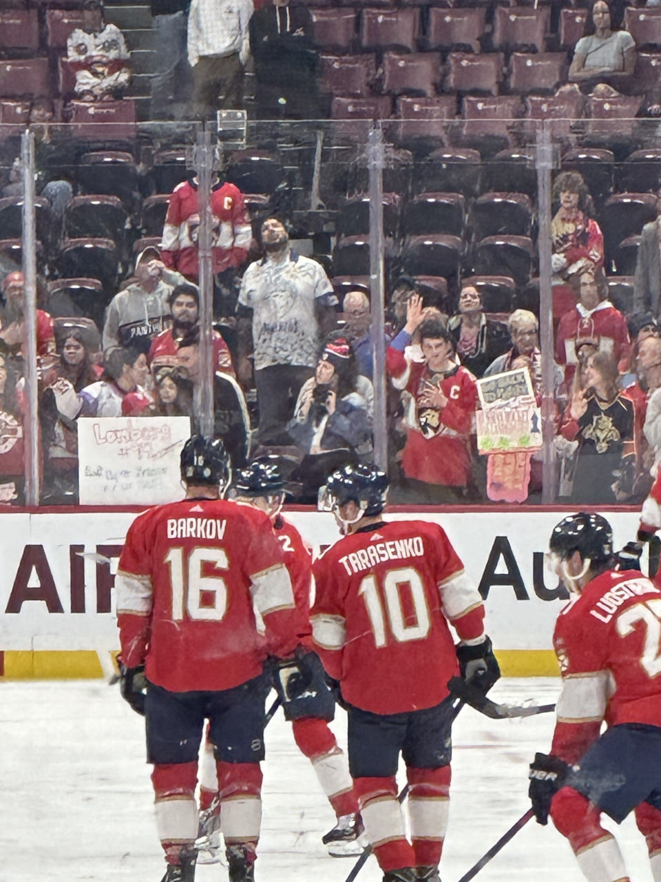 Aleksander Barkov with Florida Panthers teammates on the bench
